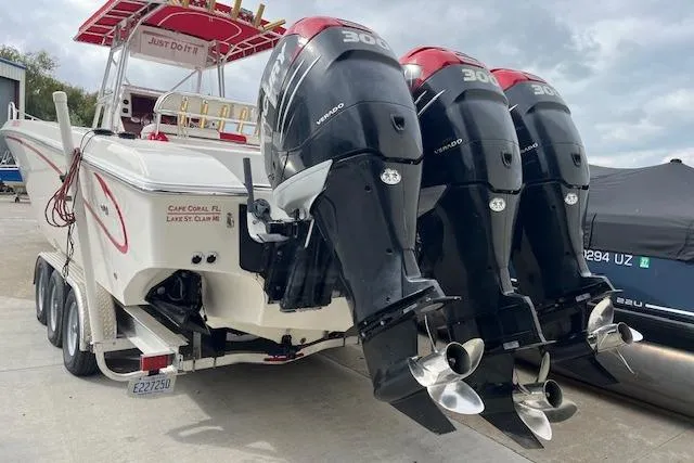 Slide: The Image of 2001 Fountain 38 Center Console boat in indoor storage facility. - 3