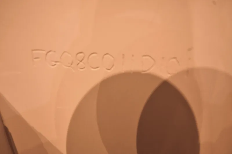 Slide: The Image of Hull identification number on 2001 Fountain 38 Center Console boat. - 66