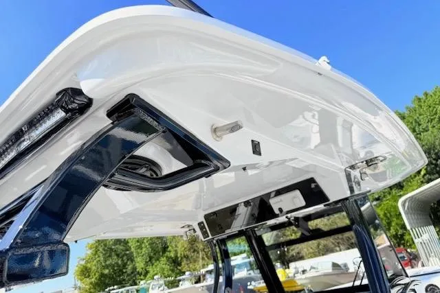 Slide: The Image of 2026 Tidewater 302 CC Adventure boat, featuring sleek design and modern equipment. - 20