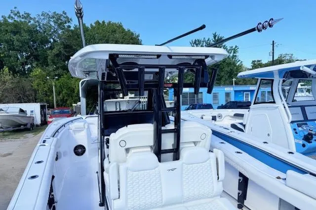 Slide: The Image of 2026 Tidewater 302 CC Adventure boat with sleek design and modern features. - 5