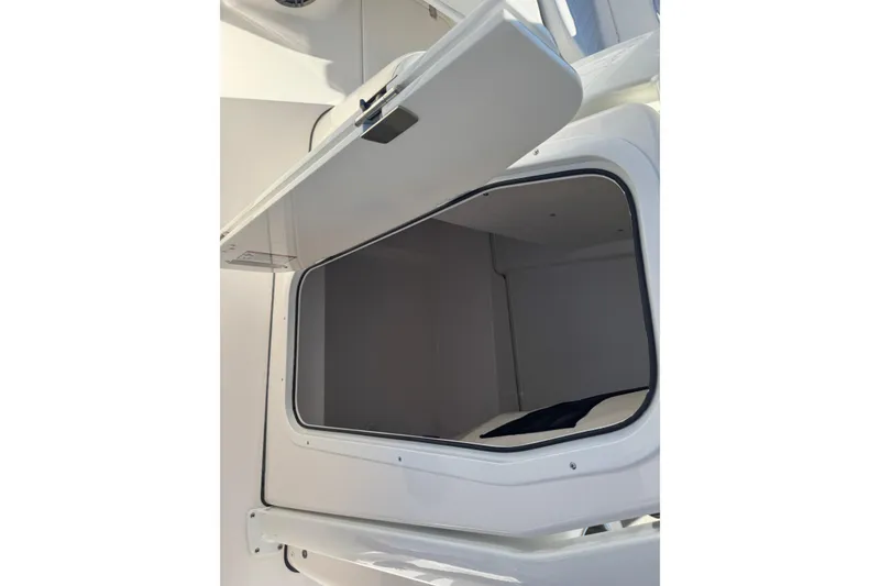 Slide: The Image of Open storage compartment on 2026 Sea Fox 228 Commander boat. - 14