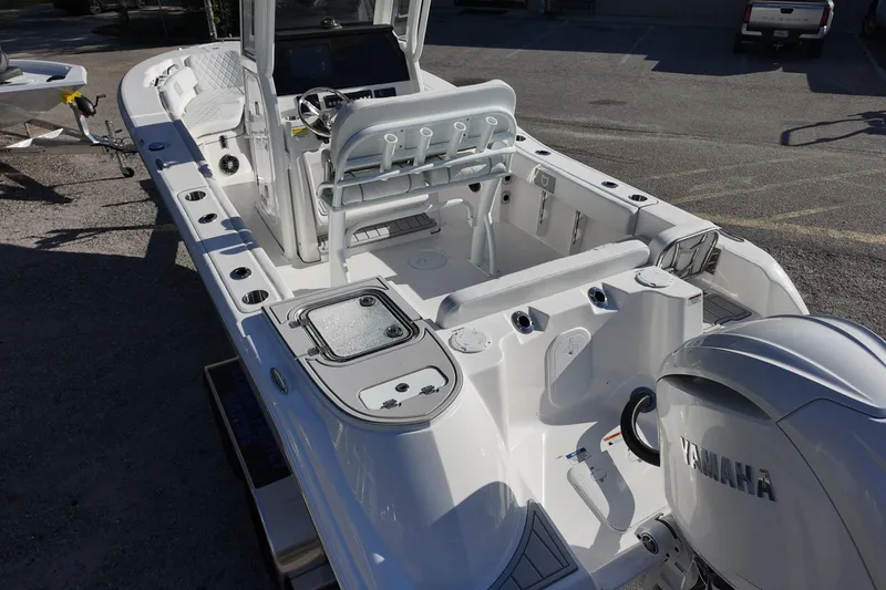 Slide: The Image of 2026 Sea Fox 228 Commander boat interior with Yamaha engine, featuring modern design and seating. - 17
