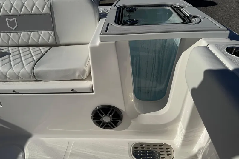 Slide: The Image of 2026 Sea Fox 228 Commander interior with cushioned seating and built-in speaker. - 18