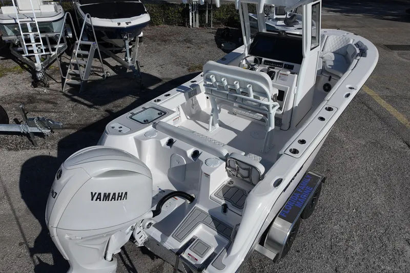 Slide: The Image of 2026 Sea Fox 228 Commander boat with Yamaha engine, parked on a trailer. - 5