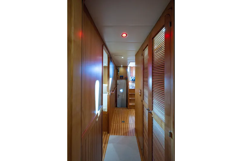 Slide: The Image of Companionway looking aft from owners stateroom. Aluminum engine room door with inspection port - 24