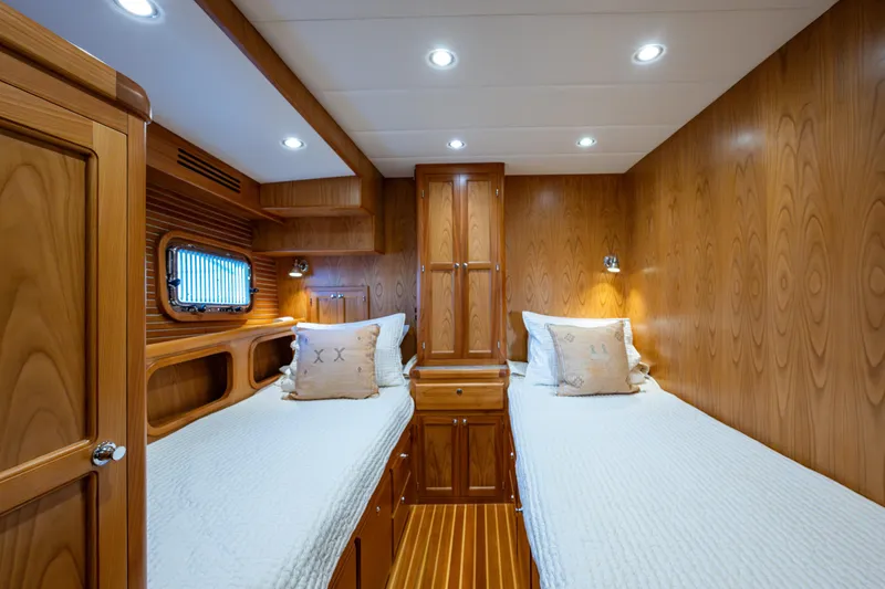 Slide: The Image of Guest cabin with drawer storage under the berths and locker storage - 26