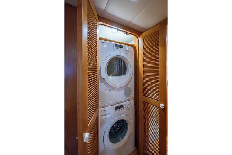 Slide: The Image of Laundry with separate Bosch washer and dryer - 31