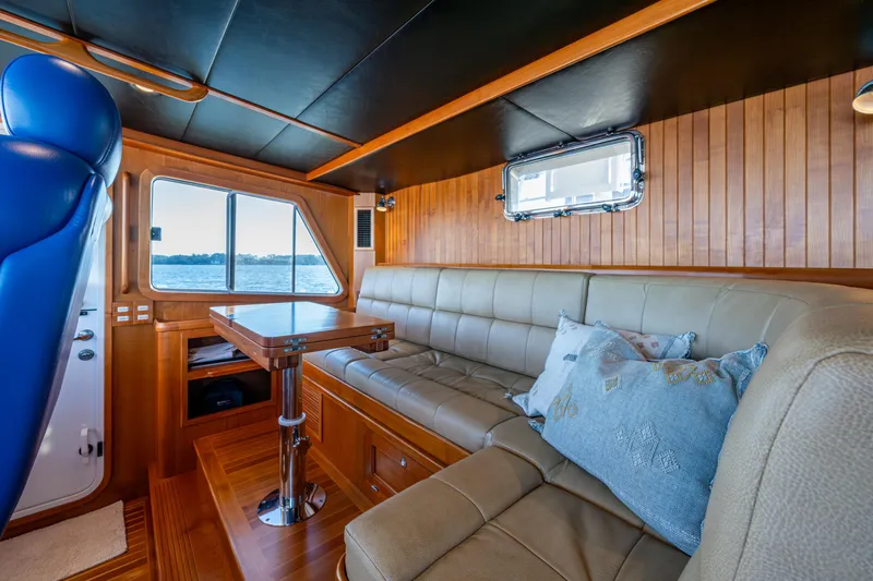 Slide: The Image of L-shaped pilothouse settee that converts to a large double berth - 43