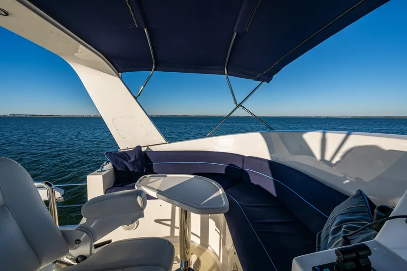 Slide: The Image of Flybridge settee, table, arch (folding) and bimini - 49