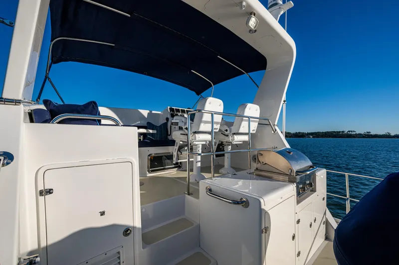 Slide: The Image of Summer kitchen, under-bridge storage door and Stidd helm seats - 51