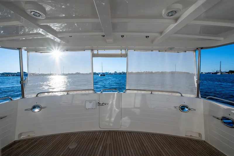 Slide: The Image of Expansive fully covered aft deck with full transom door and sun shades - 6
