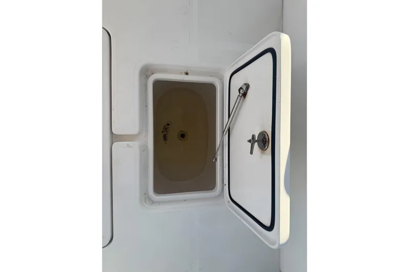 Slide: The Image of Open storage compartment on 2024 Invincible 39 Open Fisherman boat. - 27