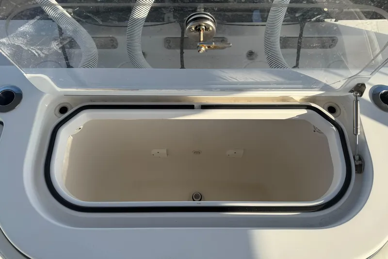 Slide: The Image of Open storage compartment on 2024 Invincible 39 Open Fisherman boat. - 36