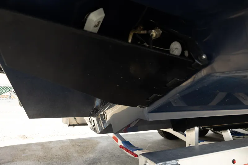 Slide: The Image of 2024 Invincible 39 Open Fisherman boat hull detail on trailer. - 43