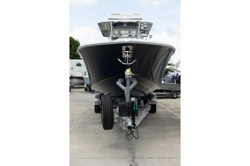 Slide: The Image of 2024 Invincible 39 Open Fisherman boat on trailer, front view. - 49