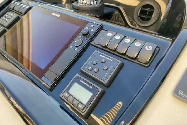 Slide: The Image of Control panel of 2019 Beneteau Gran Turismo 40 yacht with navigation equipment. - 21