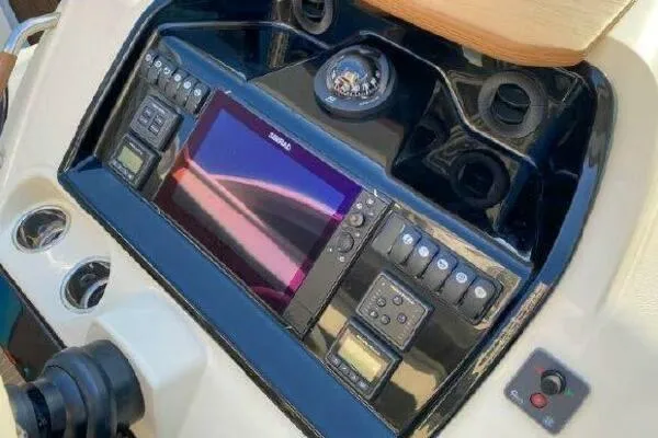 Slide: The Image of Control panel of 2019 Beneteau Gran Turismo 40 yacht with navigation equipment. - 22