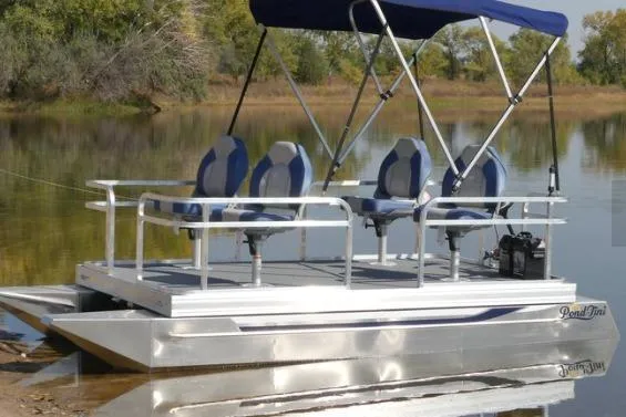 Slide: The Image of Pond-Tini Series 12 pontoon boat with canopy on a serene lake, 2025 model. - 5
