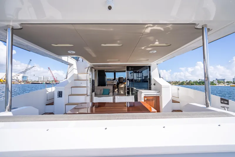 Slide: The Image of Luxurious 2019 Azimut 66 yacht interior with modern design and waterfront view. - 35