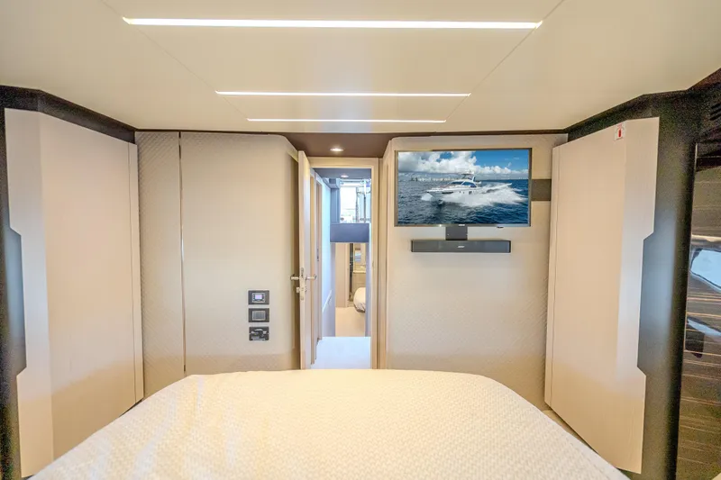 Slide: The Image of Luxurious interior of 2019 Azimut 66 yacht with modern TV and elegant design. - 71