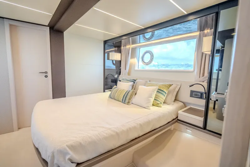 Slide: The Image of Luxurious bedroom interior of 2019 Azimut 66 yacht with modern design and ocean view. - 73