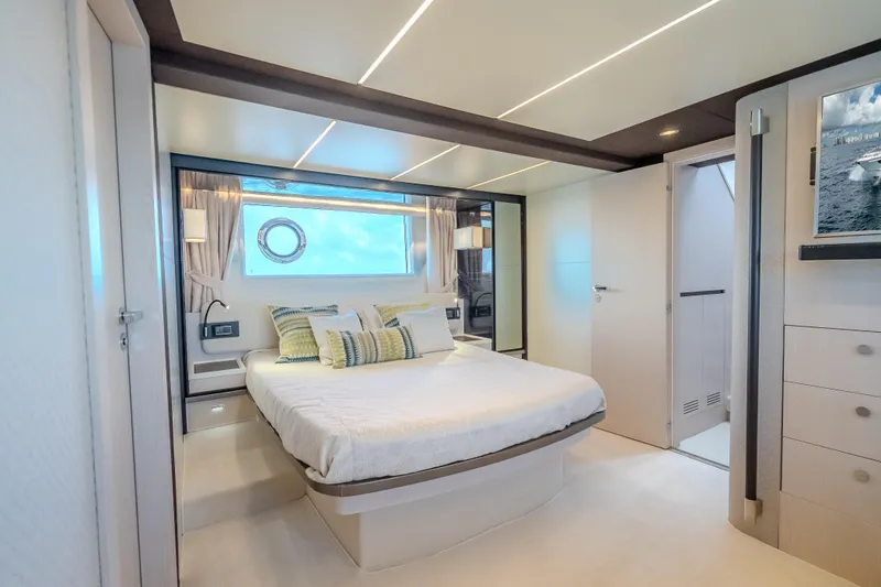 Slide: The Image of Luxurious bedroom interior of 2019 Azimut 66 yacht with modern design and elegant furnishings. - 75