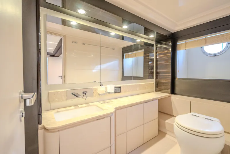 Slide: The Image of Luxurious bathroom interior of 2019 Azimut 66 yacht with modern fixtures and elegant design. - 76