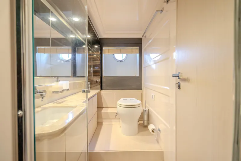 Slide: The Image of Luxurious bathroom in 2019 Azimut 66 yacht with modern fixtures and elegant design. - 79