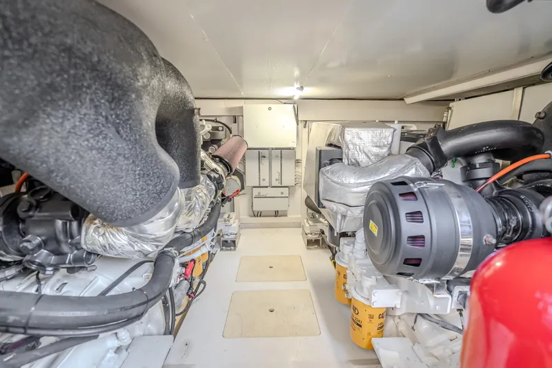 Slide: The Image of Engine room of 2019 Azimut 66 yacht, showcasing advanced machinery and components. - 90