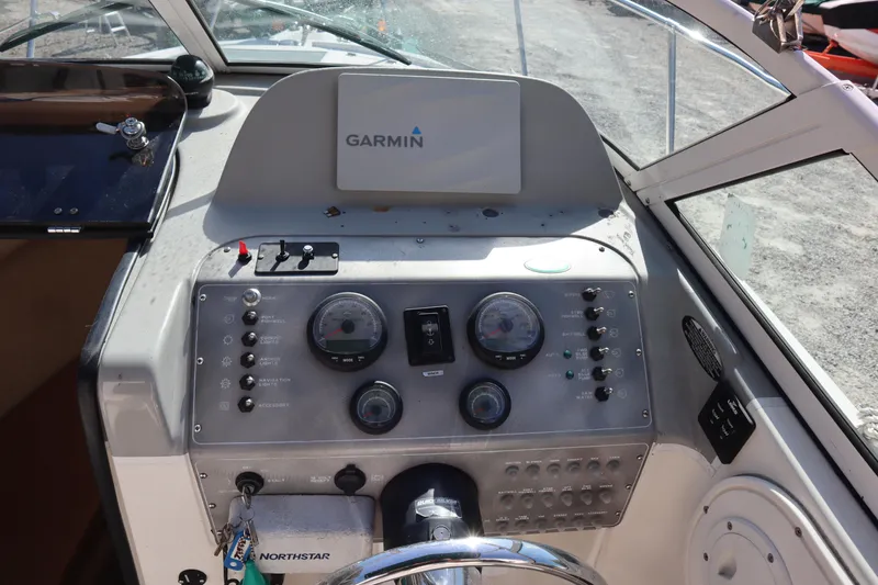 Slide: The Image of 2008 Trophy 2102 Walkaround boat dashboard with Garmin navigation system. - 2