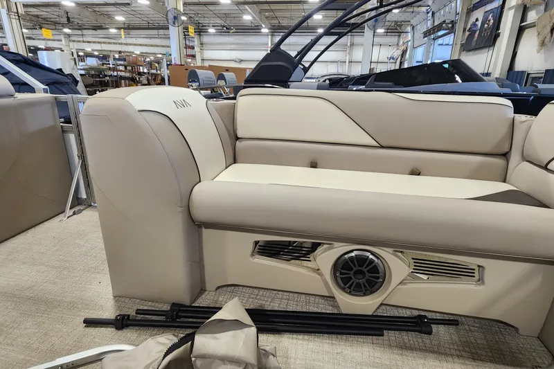 Slide: The Image of 2026 Avalon VENTURE CRUISE boat interior with beige seating and speaker system. - 14
