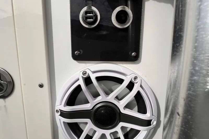 Slide: The Image of Speaker and USB ports on a 1993 Fountain 27 Center Console boat. - 114