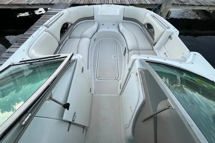 Slide: The Image of Interior view of 2002 Four Winns 264 Funship boat with spacious seating. - 17