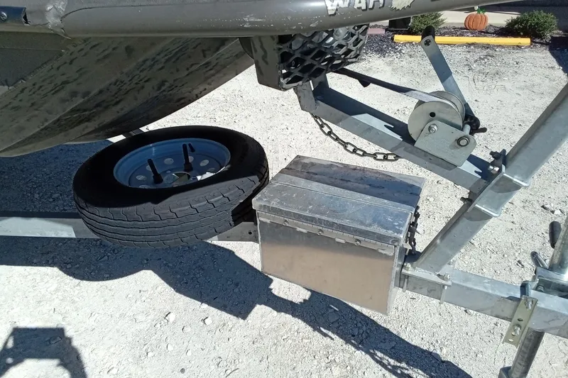 Slide: The Image of Trailer hitch and spare tire of 2020 War Eagle 750 Gladiator boat. - 5