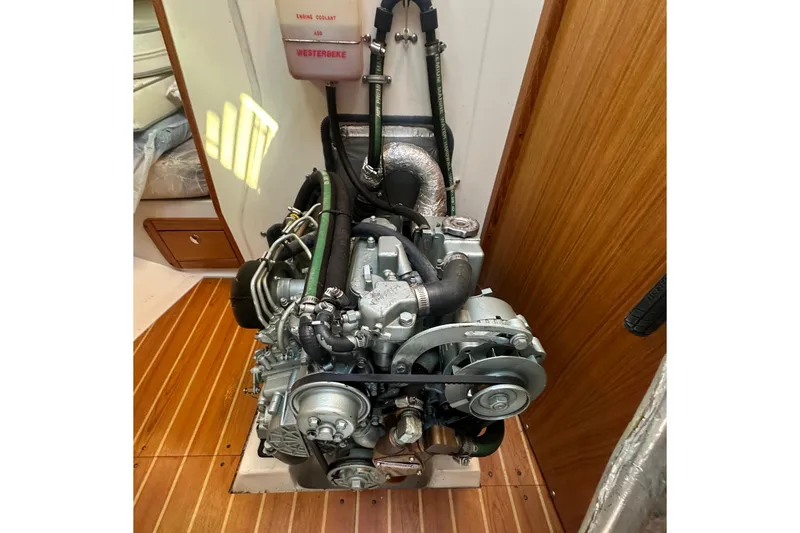 Slide: The Image of Engine of a 2005 Catalina 310 sailboat, featuring a Westerbeke system. - 34