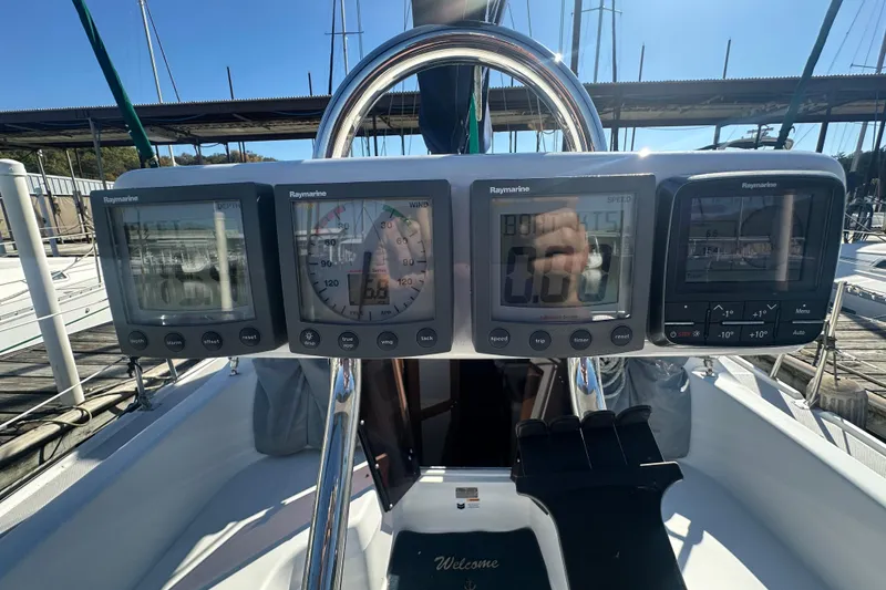 Slide: The Image of Cockpit of 2005 Catalina 310 sailboat with Raymarine navigation instruments. - 5
