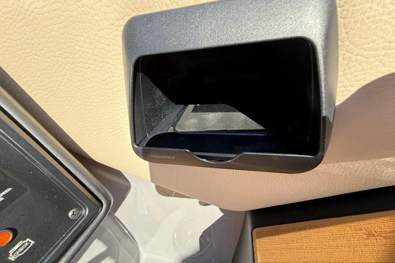 Slide: The Image of Dashboard compartment in 2026 Moomba Mojo boat interior. - 31