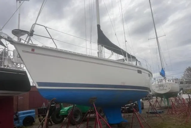 Slide: The Image of 1996 Hunter 37.5 Legend sailboat on stands, ready for maintenance. - 10