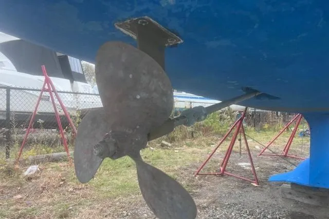 Slide: The Image of Propeller of 1996 Hunter 37.5 Legend sailboat on dry dock. - 12