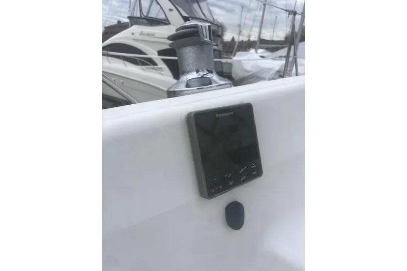 Slide: The Image of 1996 Hunter 37.5 Legend sailboat cockpit with Raymarine instrument panel. - 15