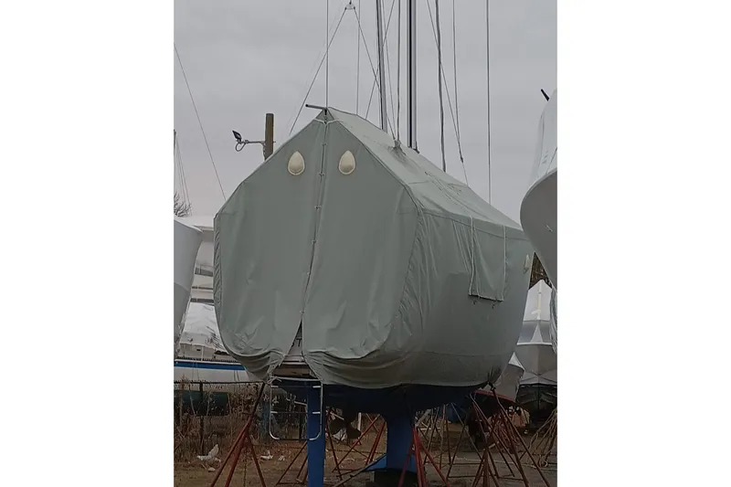 Slide: The Image of Covered 1996 Hunter 37.5 Legend sailboat on stands, prepared for storage. - 22