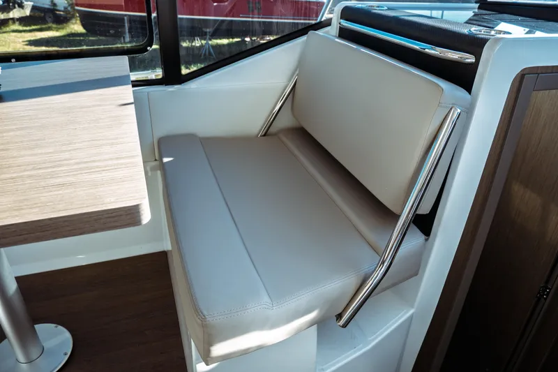 Slide: The Image of 2024 Jeanneau NC 895 Series 2 boat kitchen with stainless steel gas stove. - 14