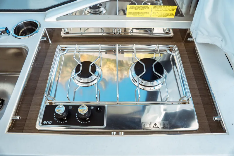 Slide: The Image of Steering console of 2024 Jeanneau NC 895 Series 2 with Garmin navigation system. - 19