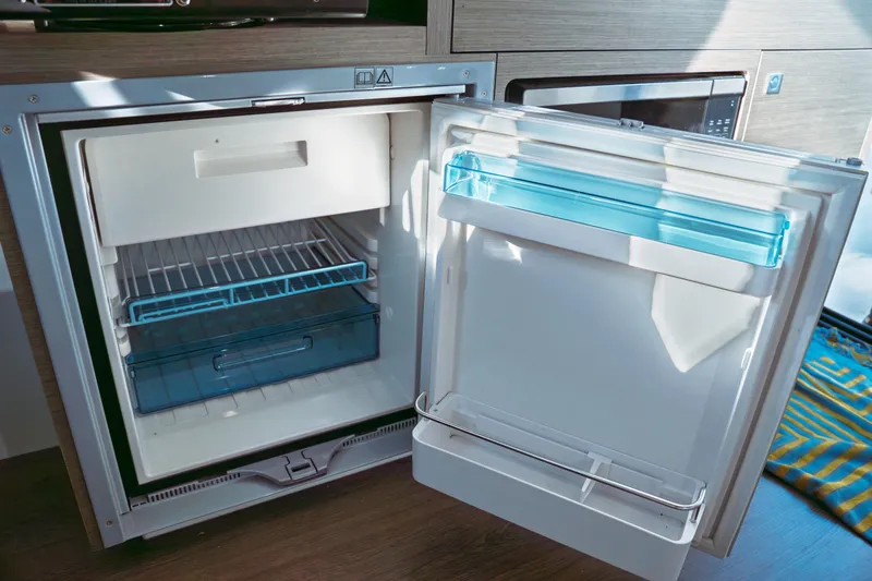 Slide: The Image of 2024 Jeanneau NC 895 Series 2 boat throttle control, featuring modern design and functionality. - 22