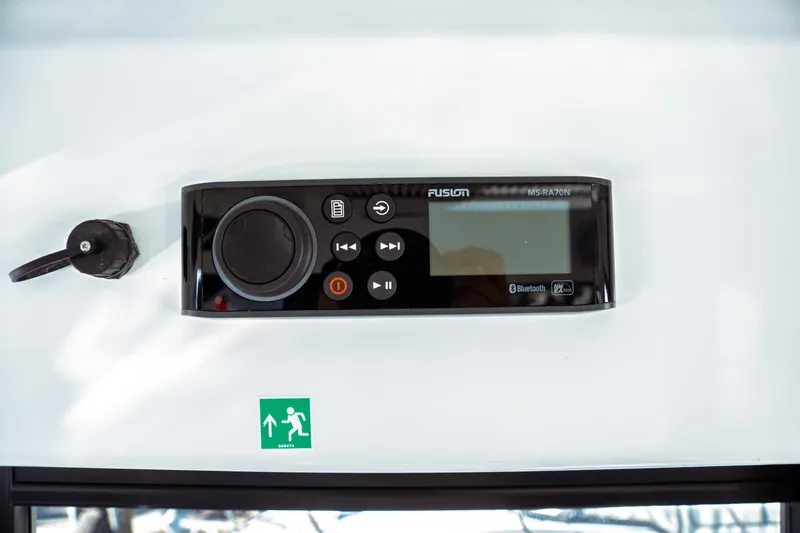 Slide: The Image of 2024 Jeanneau NC 895 Series 2 cabin interior with round bed and window view. - 29