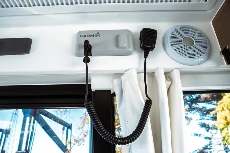 Slide: The Image of 2024 Jeanneau NC 895 Series 2 cabin interior with round bed and window view. - 30