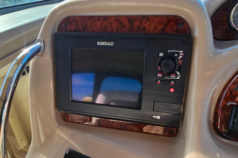 Slide: The Image of Mercury SmartCraft display on 2004 Sea Ray 320 Sundancer showing vessel status and fuel data. - 13