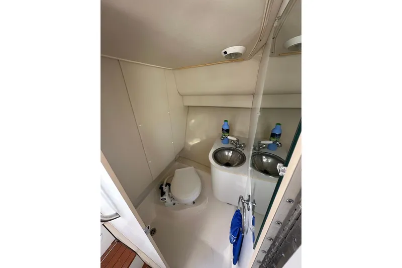 Slide: The Image of 2002 Tiara Yachts 2900 Coronet bathroom with toilet and sink. - 24