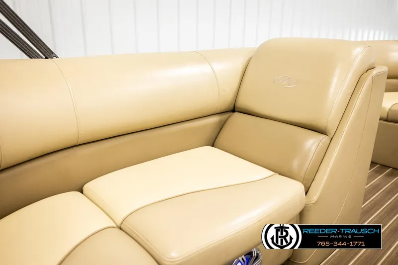 Slide: The Image of Luxurious beige seating in 2017 Manitou Oasis SHP pontoon boat interior. - 46