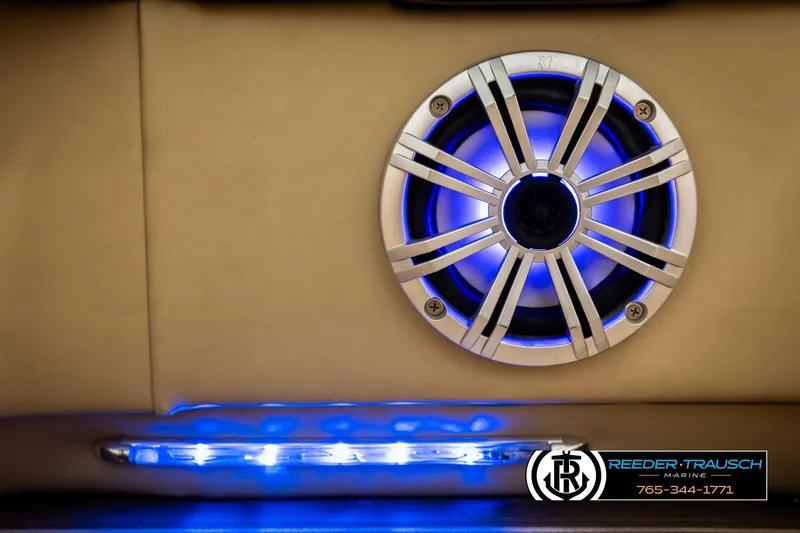 Slide: The Image of Speaker with blue LED lights on 2017 Manitou Oasis SHP boat interior. - 47